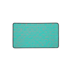 Durable desk mat for gaming showcasing a turquoise geometric pattern, equipped with anti-slip backing to keep your desk organized and clutter-free.