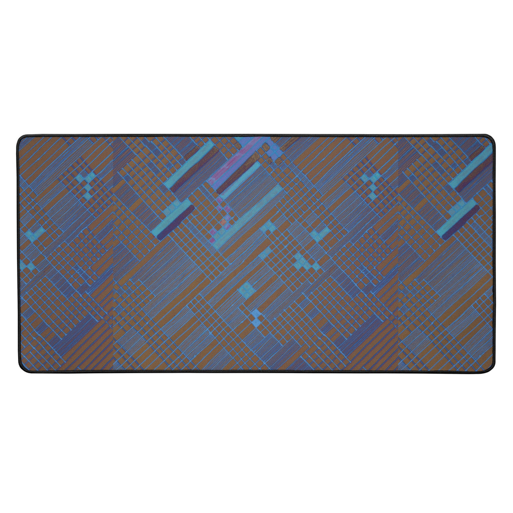 Stylish desk mat for work featuring a geometric blue and brown pattern, designed for gaming and office use with an anti-slip backing.